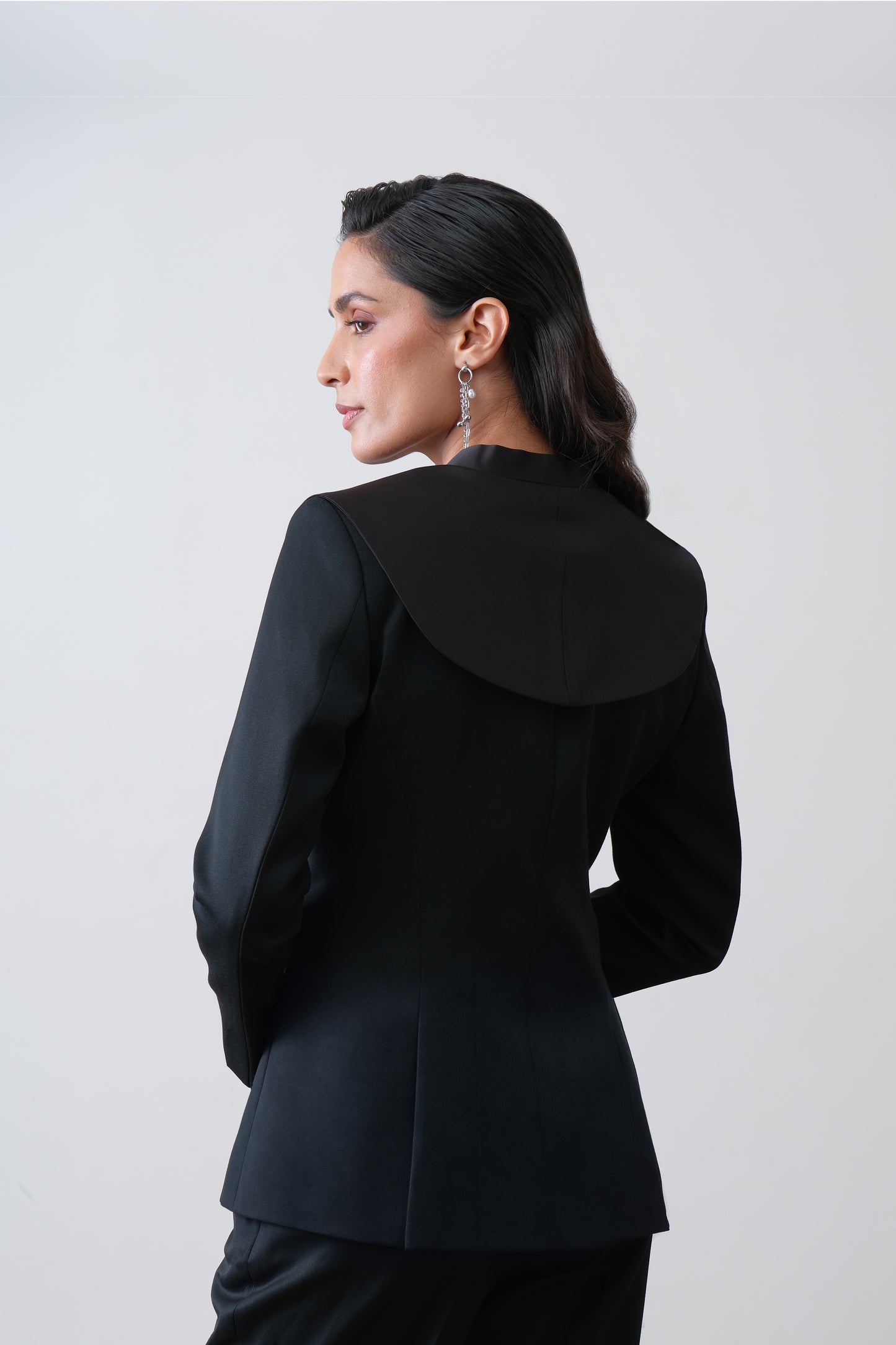 Black poly viscose blend blazer, back view with structured silhouette