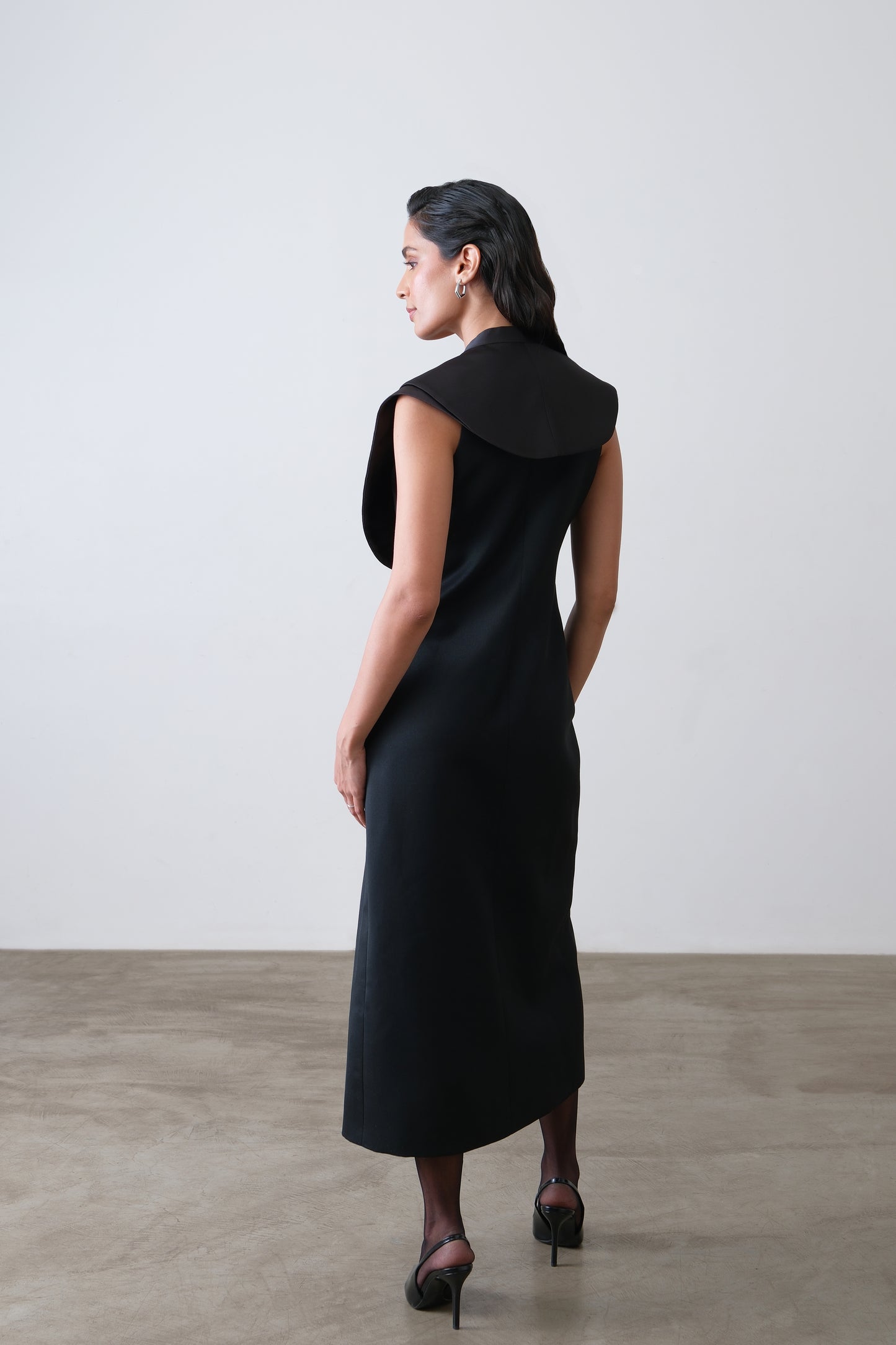 Black poly viscose blend dress, back view with tailored fit