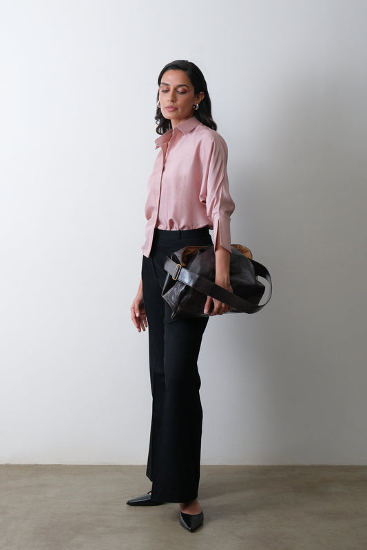 Dusty pink dupion silk shirt shown at a three quarter angle