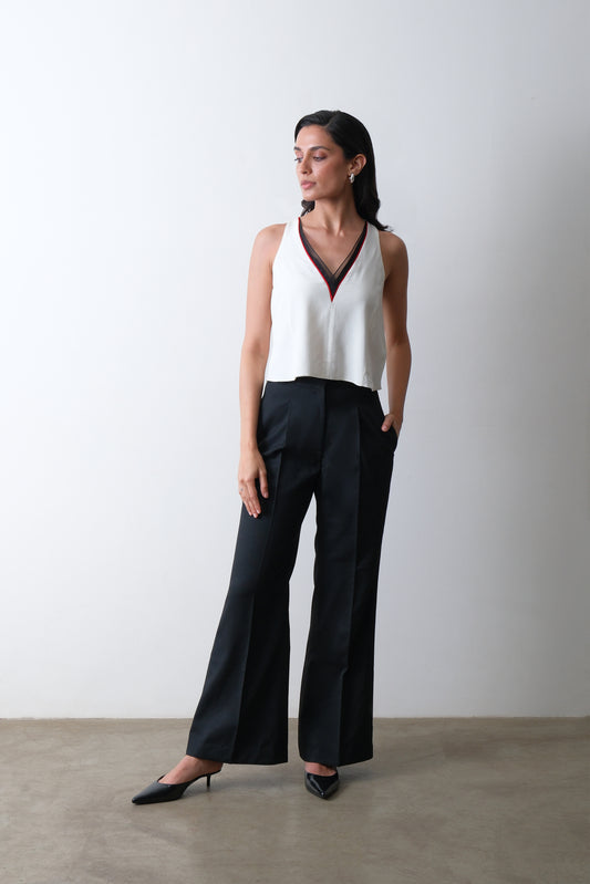 black front-pleated flared trousers