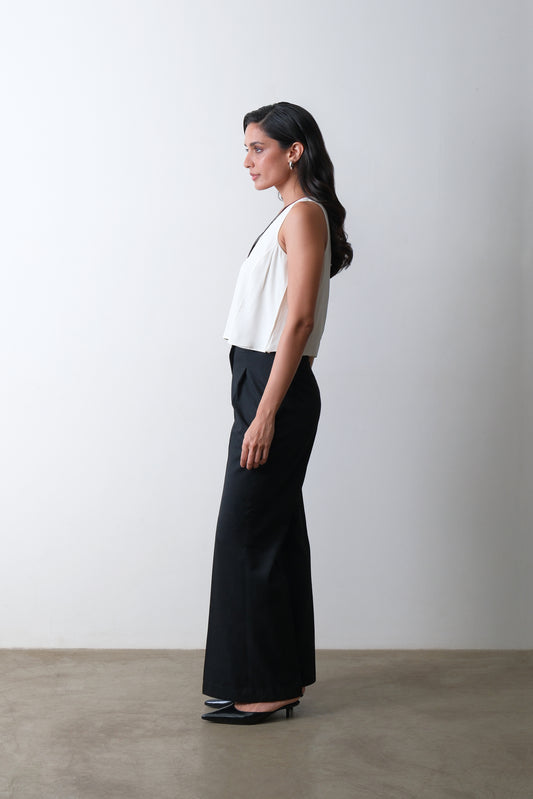 black front-pleated flared trousers