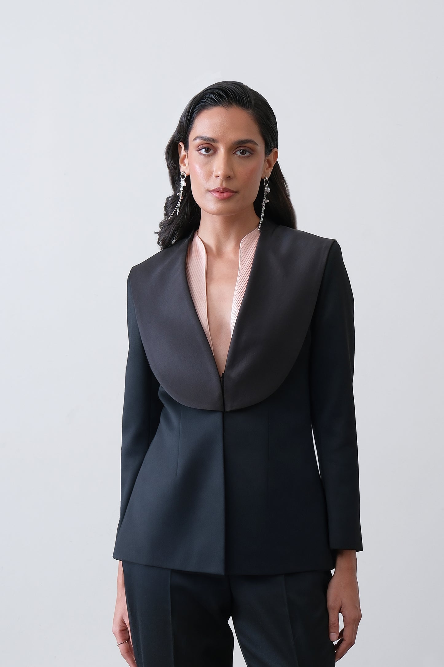 Black poly viscose blend blazer with exaggerated satin collar and sculpted fit