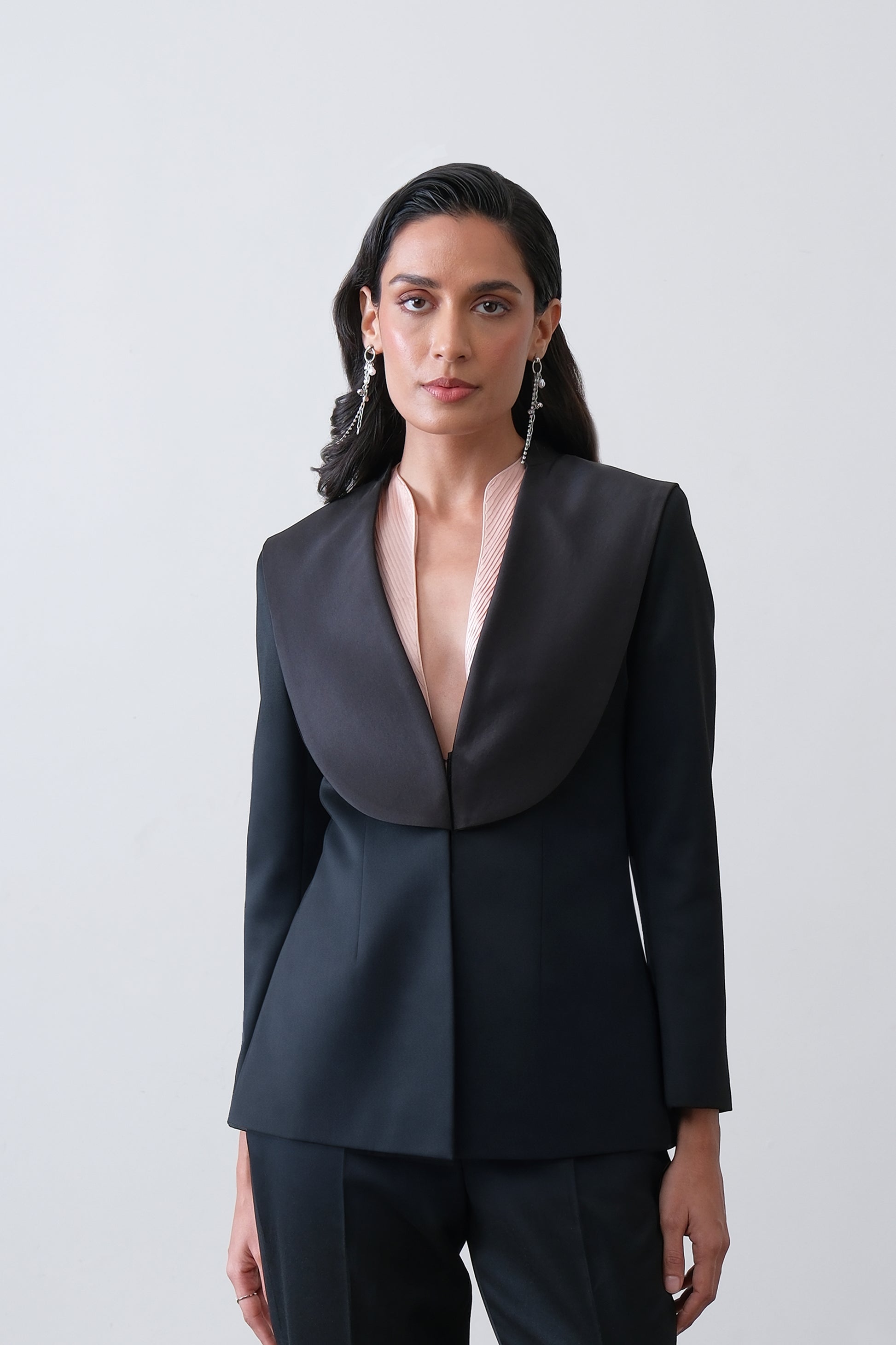 Black poly viscose blend blazer with exaggerated satin collar and sculpted fit