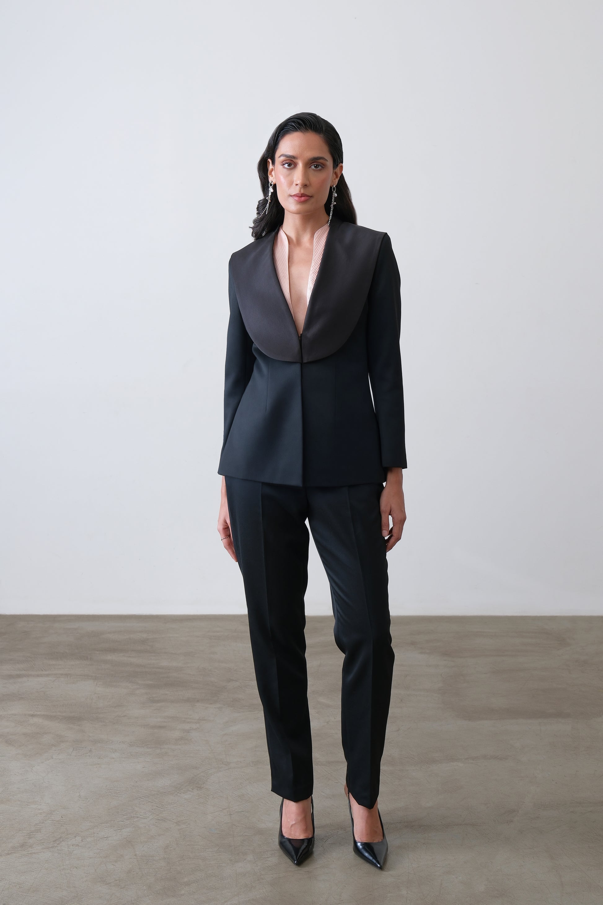 Black poly viscose blend blazer with exaggerated satin collar and sculpted fit