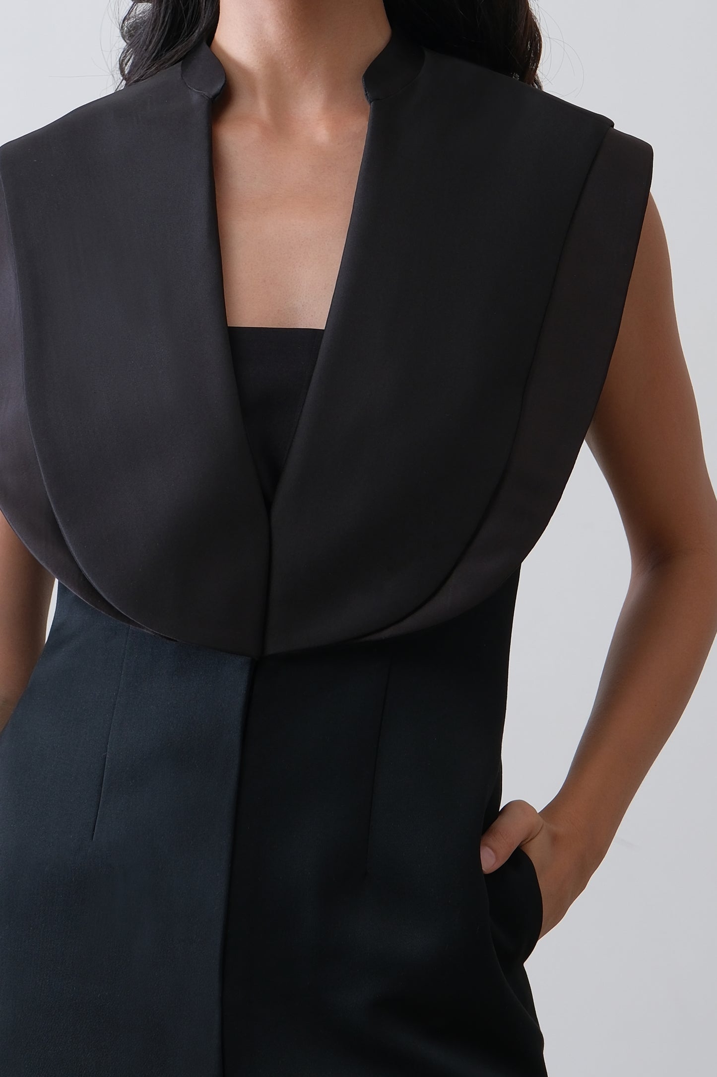 Close up of double satin collar detail on black midi dress