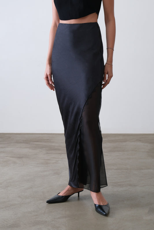 Close up of lace detail on black silk satin and georgette two piece skirt
