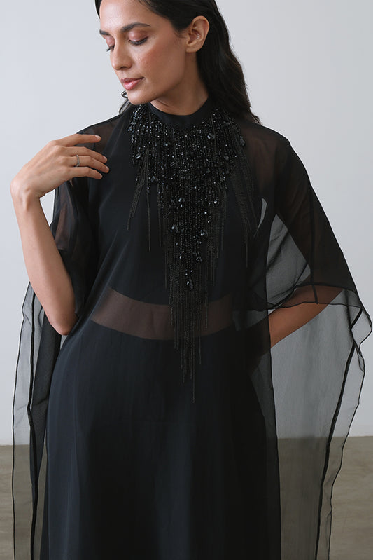 black embroidered cape