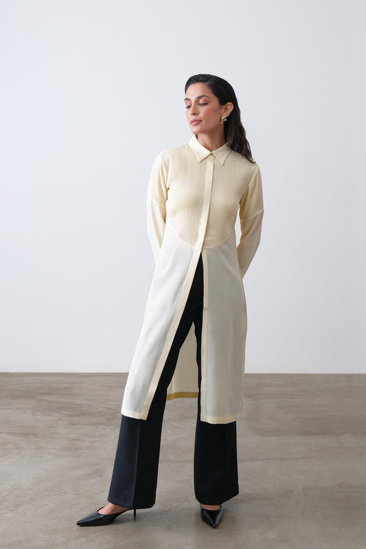 Butter yellow silk crepe longline shirt with hand tucks, ivory piping and front slit