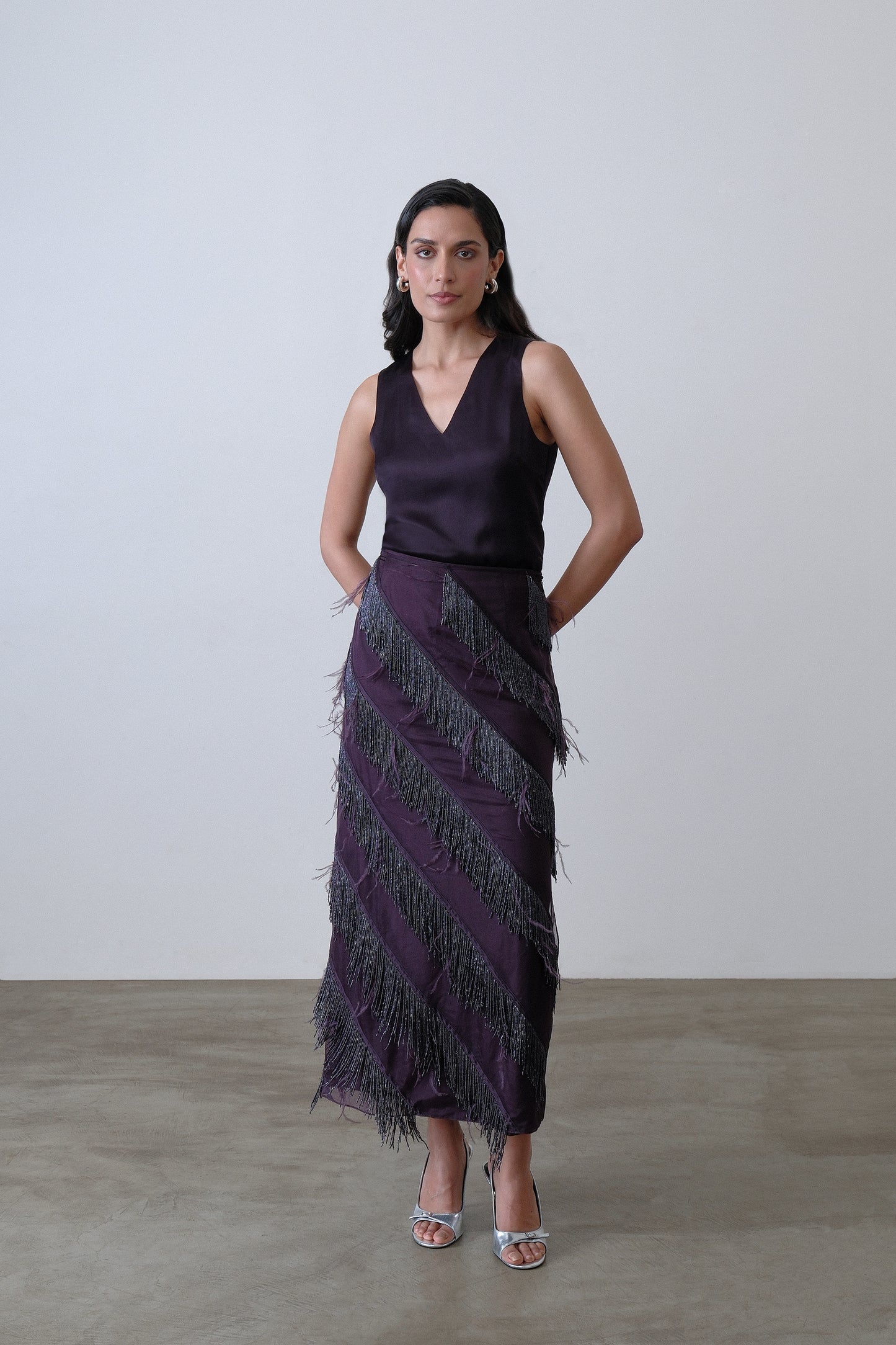 Deep plum organza and satin layered skirt with beaded fringe and feather detail