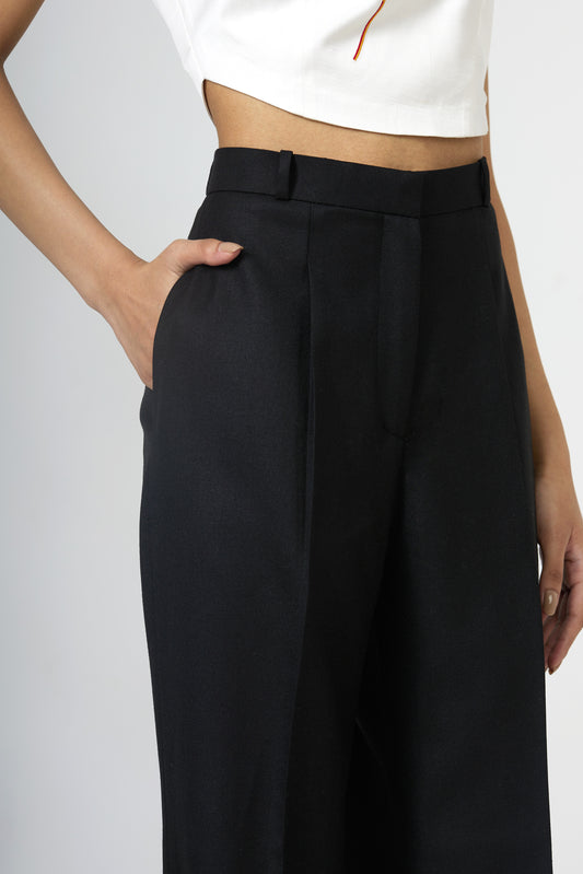 black front-pleated flared trousers