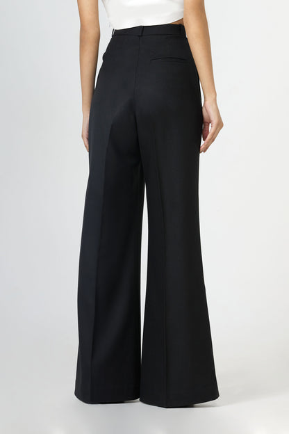 black front-pleated flared trousers