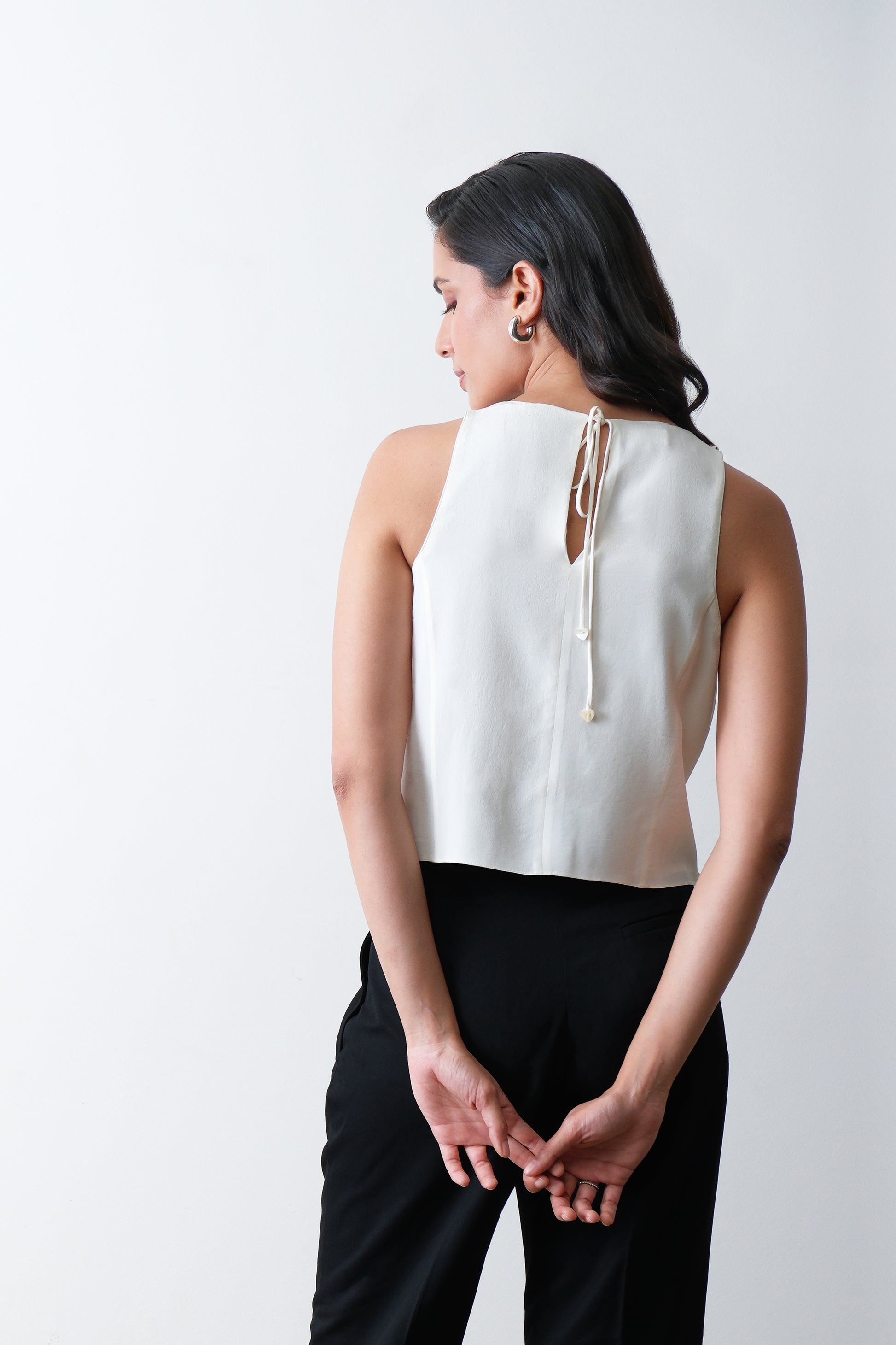 Ivory silk crepe top, back view with tie up closure